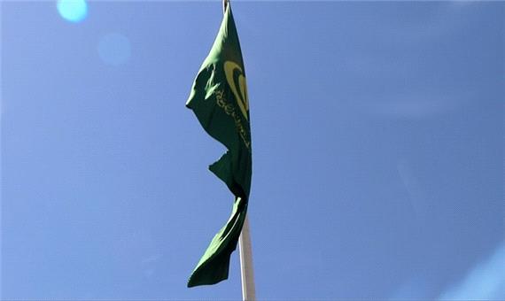 گزارش تصویری تعویض پرچم میدان امام علی (ع) همزمان با فرا رسیدن دهه ولایت