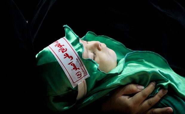 توزیع لباس‌های همایش جهانی شیرخوارگان حسینی در یزد